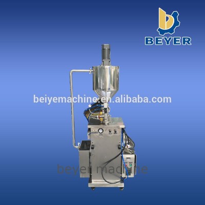 Top paste filling machine with mixing hopper